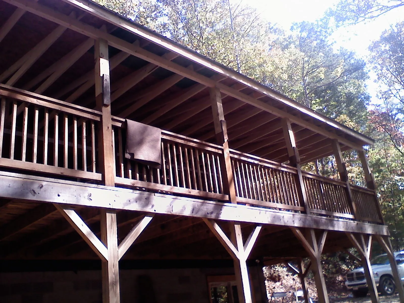 Timber framing under a new elevated porch and deck — Roof Leak Repair in Wataga by Roofing Brothers